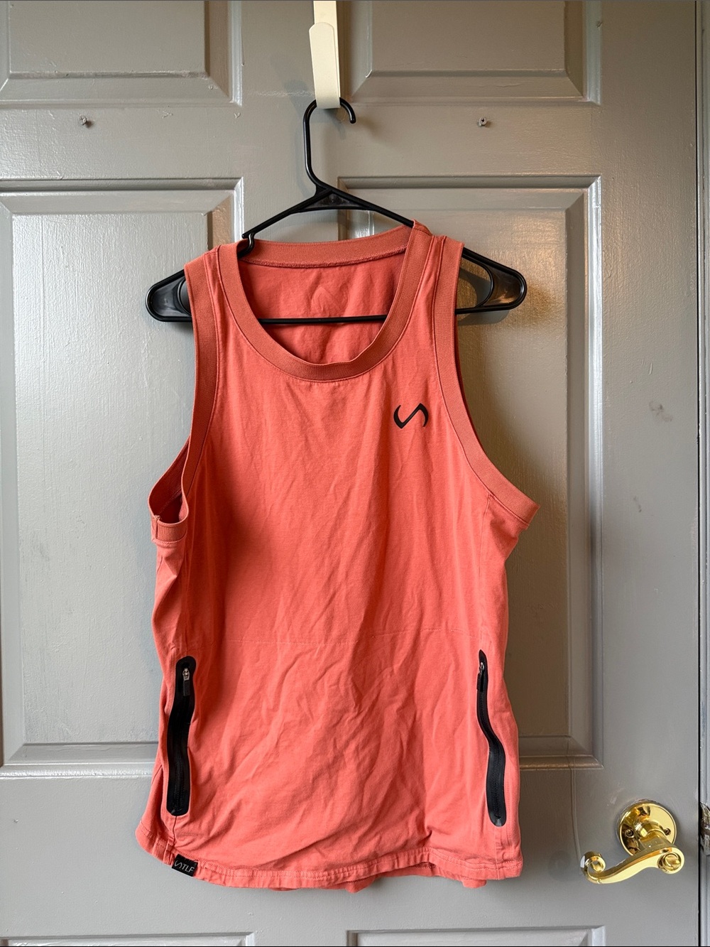 Coral Sleeveless Performance Tank with Front Zip Pockets
